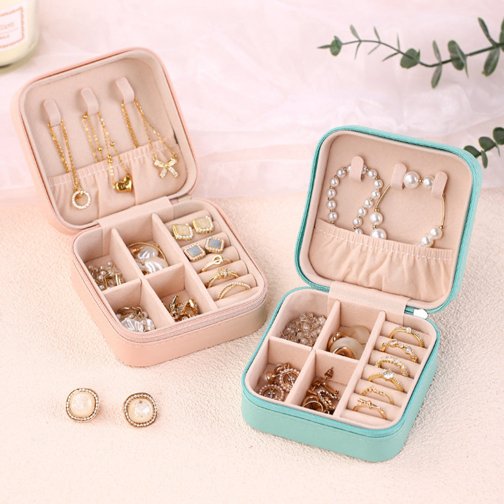 PU leather travel jewelry organizer with ring, earring, necklace storage, ideal for gifts.