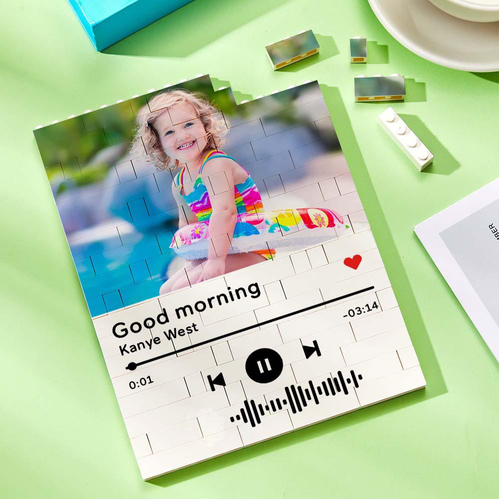 Personalized photo brick puzzle with child's photo and music code, a unique gift.