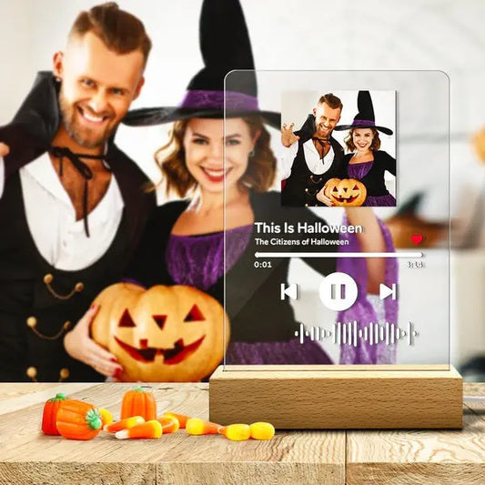 Custom Halloween photo music song plaque night light with scannable code and wooden base featuring couple in costumes.
