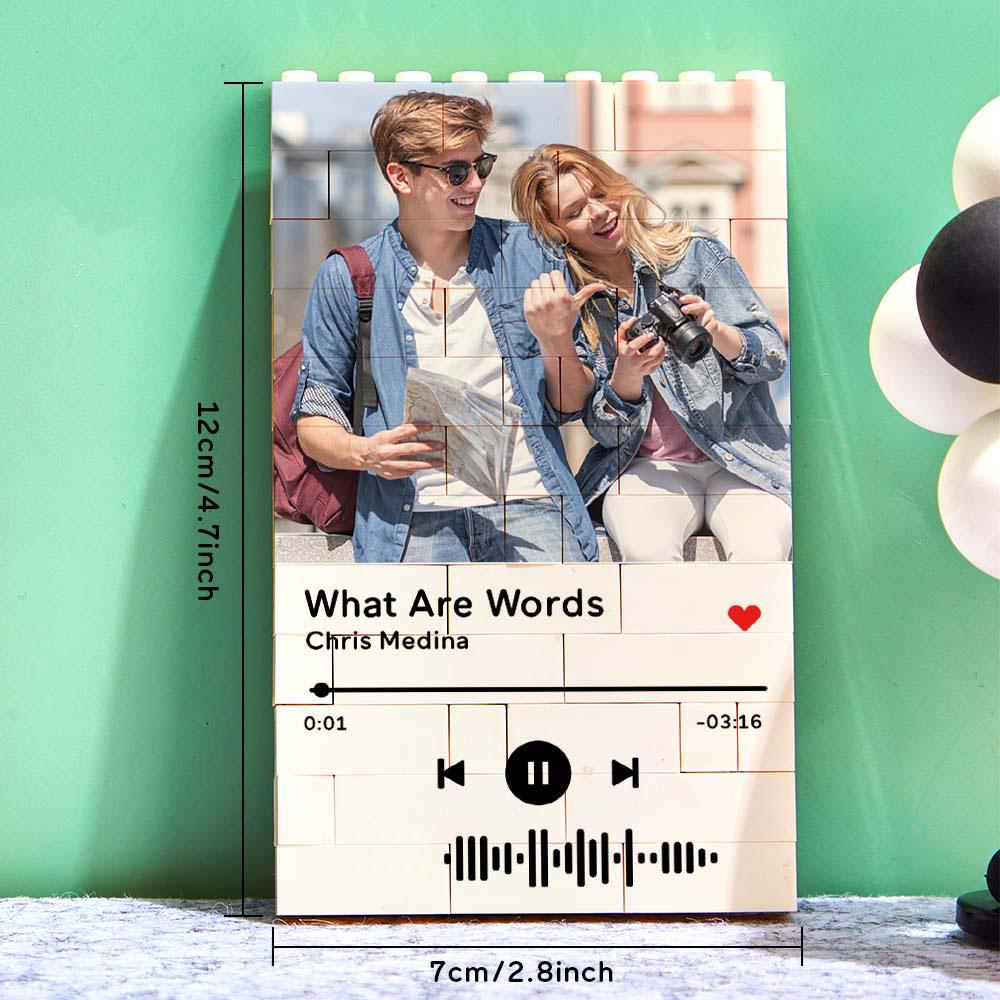 Personalized photo brick puzzle with couple's photo, music code, and song details, a romantic and unique gift.