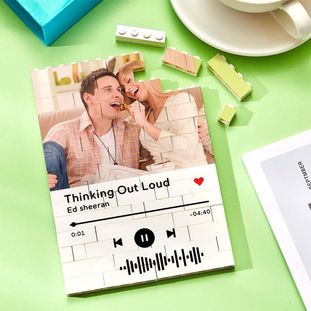 Personalized brick puzzle with couple's photo and music code, unique gift for anniversaries.