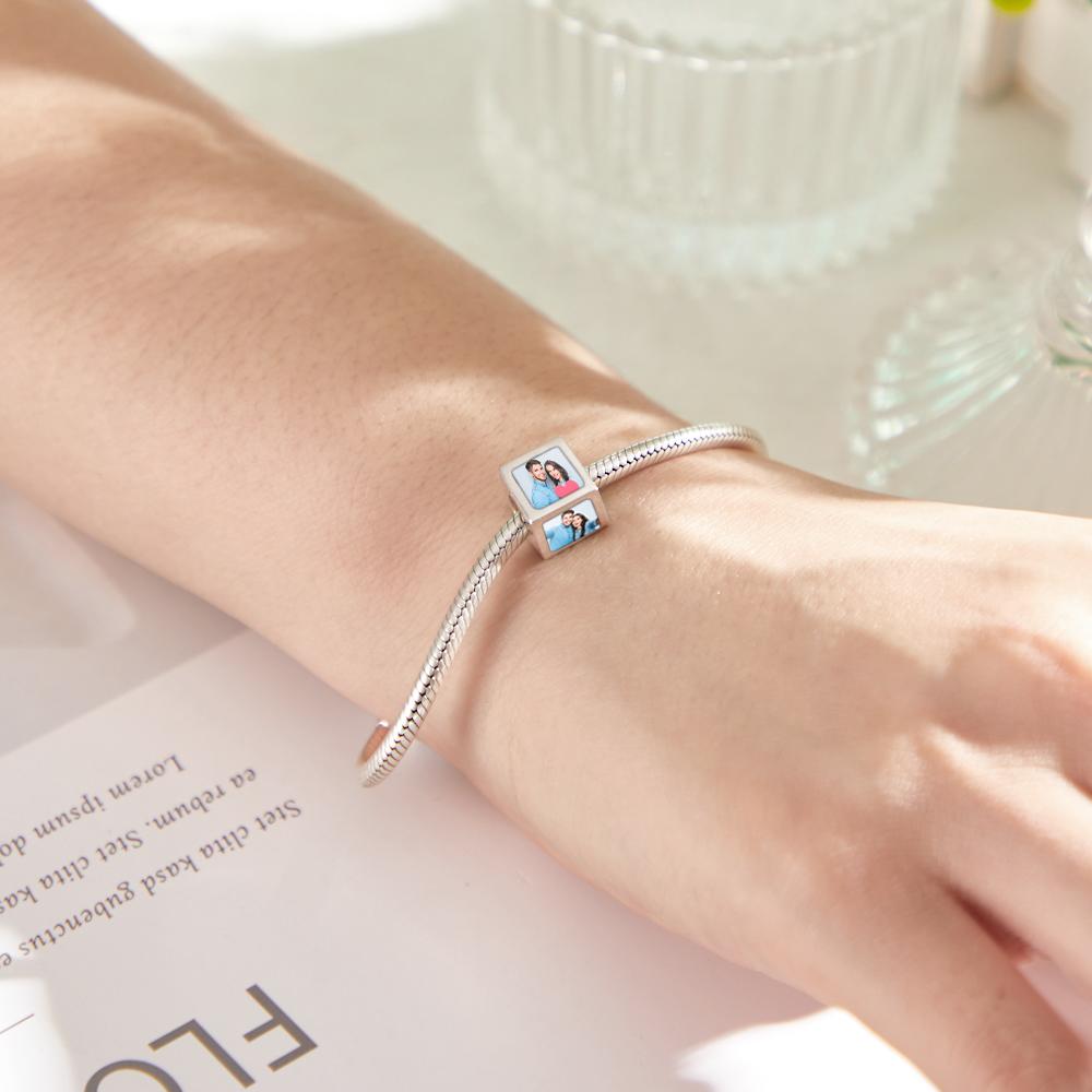 Square copper photo charm bracelet on wrist, custom gift for women. Features personalized photos.